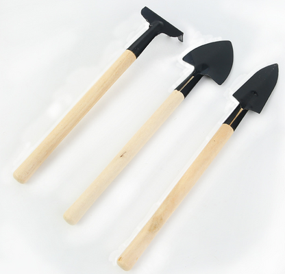 3-piece garden tool set with wooden handles – shovel, rake, and hoe for efficient gardening