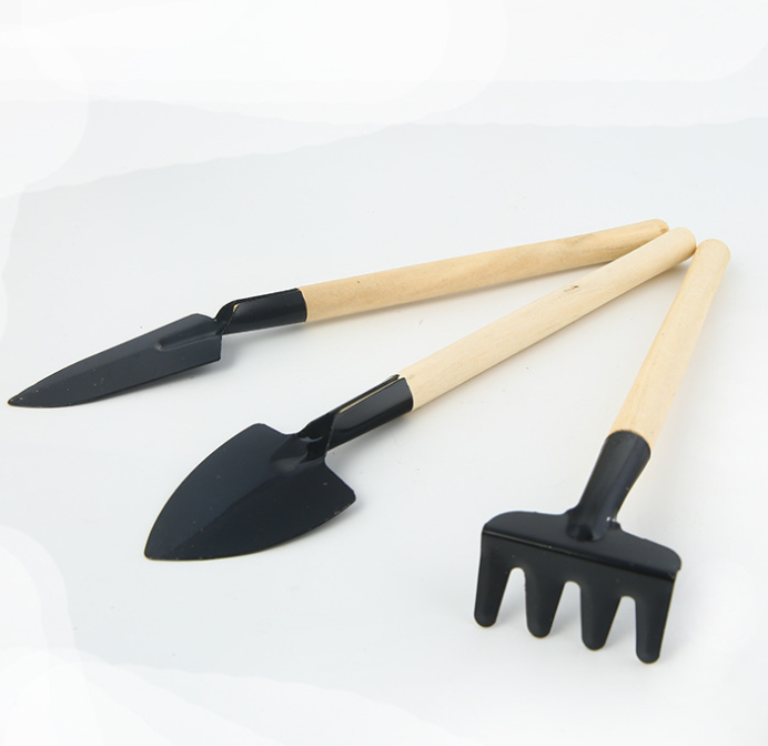 3-piece garden tool set with wooden handles – shovel, rake, and hoe for efficient gardening