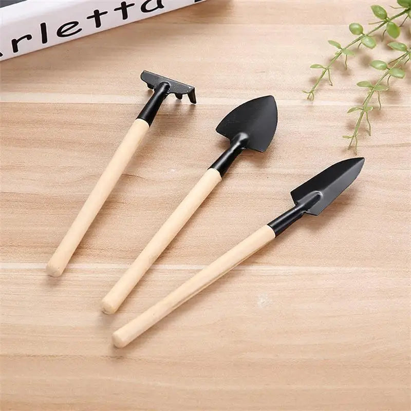3-piece garden tool set with wooden handles – shovel, rake, and hoe for efficient gardening